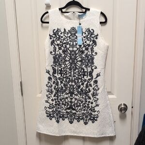 Sleeveless White Dress with Black Embroidered Front - Elegant Shift